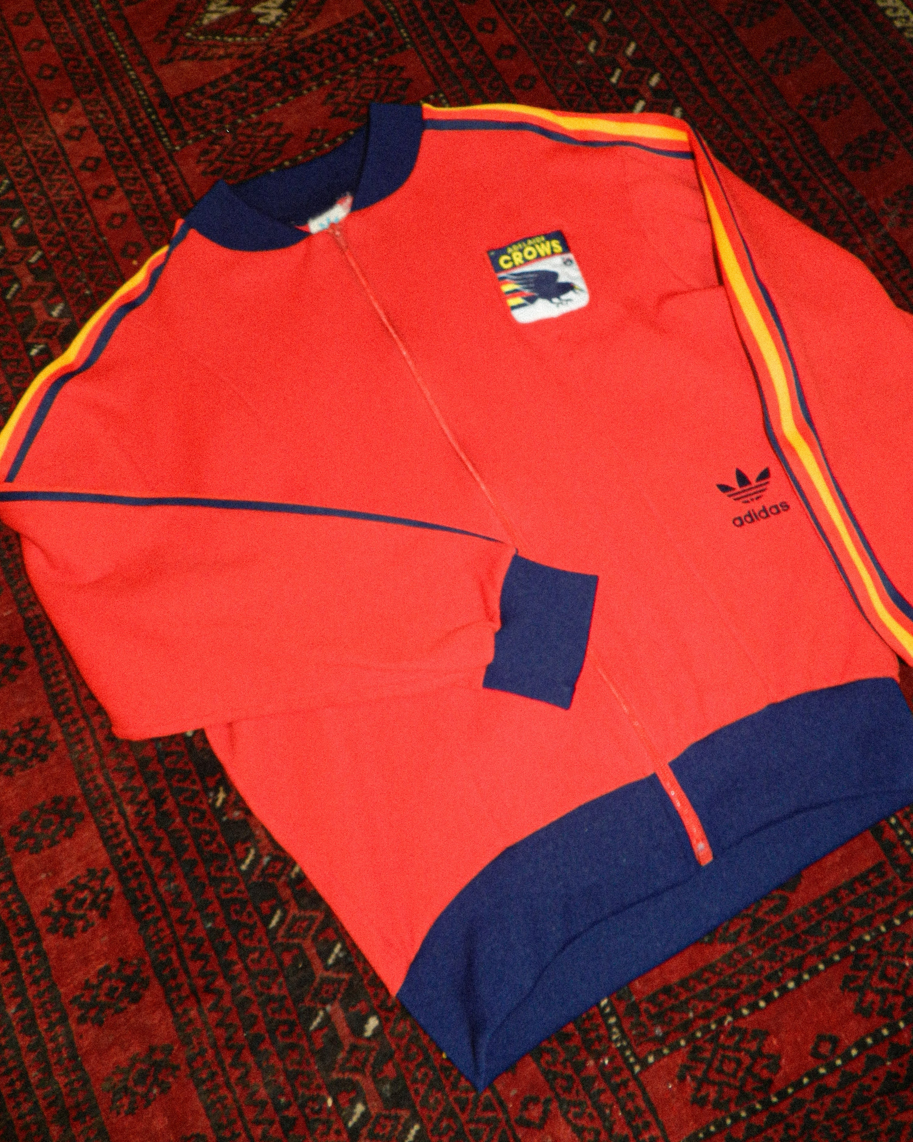 1970'S ADIDAS SOUTH AUSTRALIA TRACK JACKET (1990'S ADELAIDE CROWS PATCH) - S/M