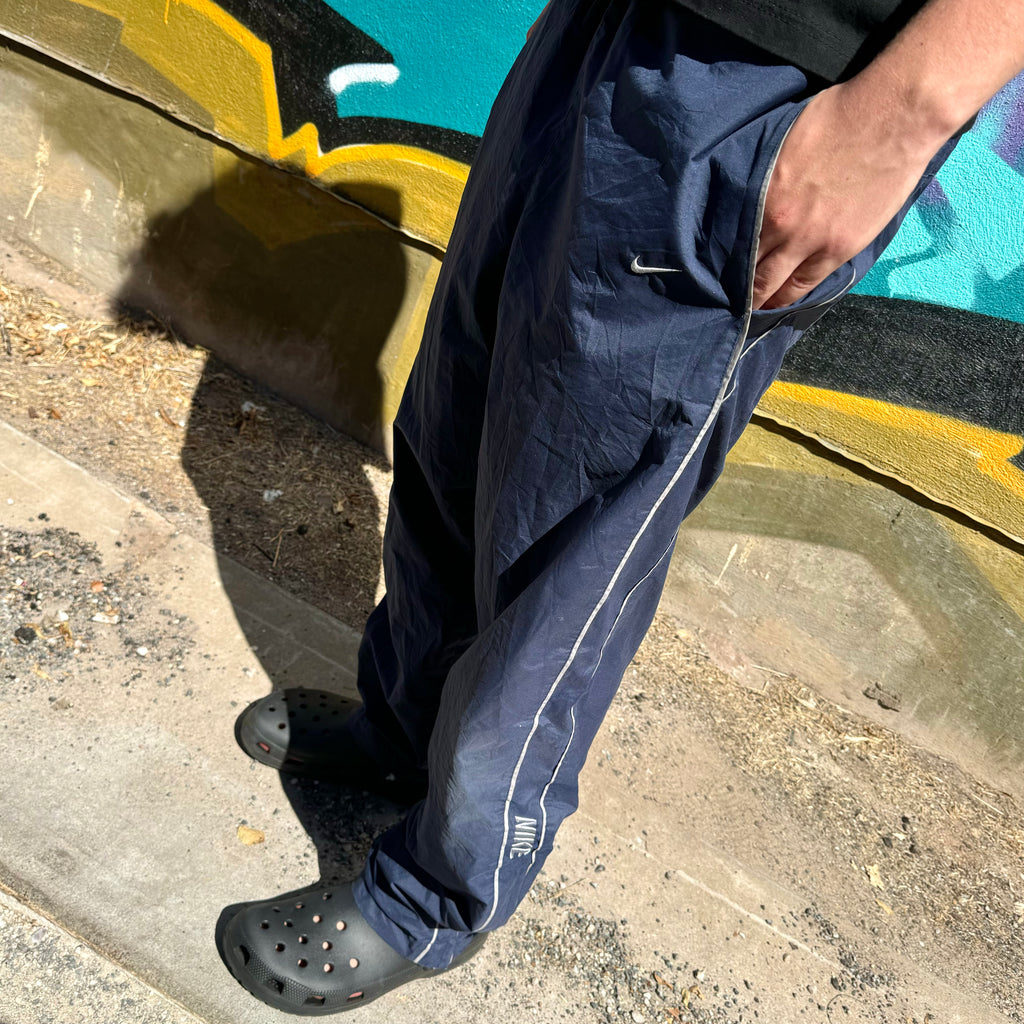 2000'S NIKE SPELLOUT PIN STRIPE TRACK PANTS - L
